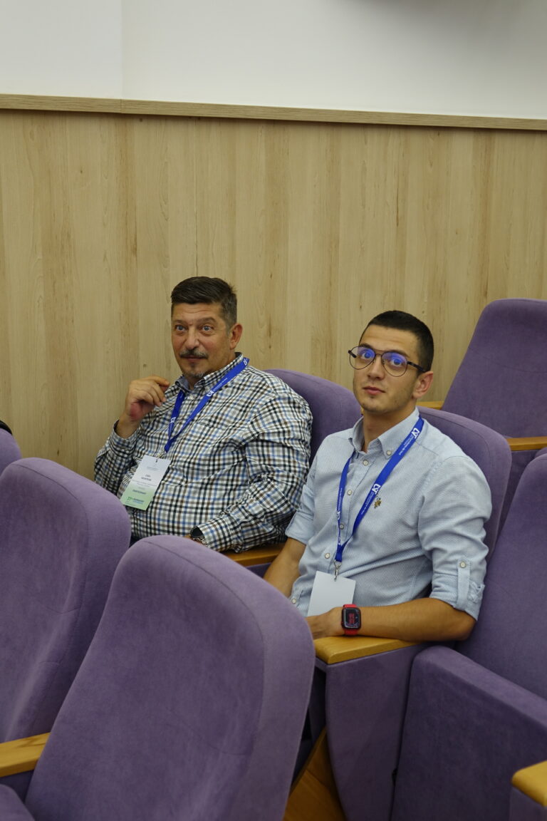 Men listening to the presentation.